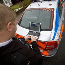 A police officer uses the Panasonic Toughbook rugged mobile computing solutions