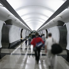 people walking in tunnel