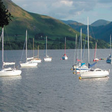 picturing sailing boats in rural scenery, cumbria, england
