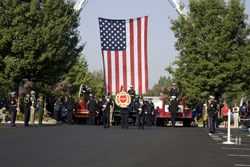 Pelco employees, honored guest and public commemorate the seventh anniversary of September 11, 2001