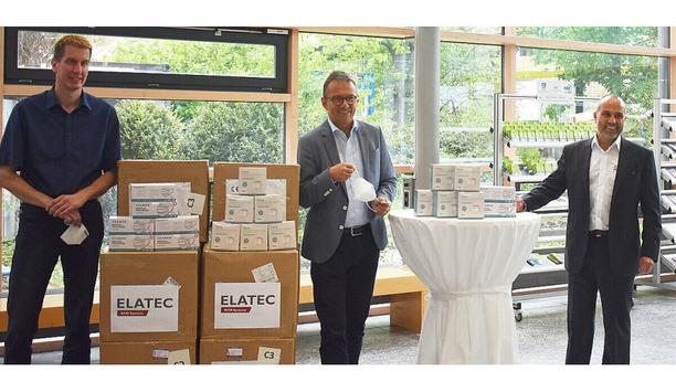 Stefan Haertel, Chief Executive Officer of RFID specialist Elatec, donates face masks for Disaster Control Department